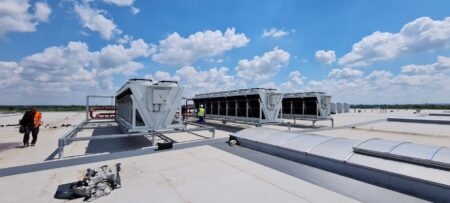 rooftop with workers and drycoolers