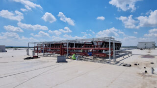 rooftop with worker and drycoolers